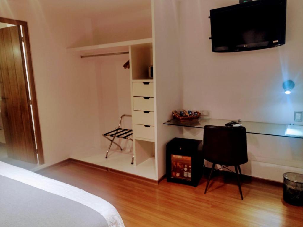 TV a/nebo společenská místnost v ubytování Hotel CLARUM 101