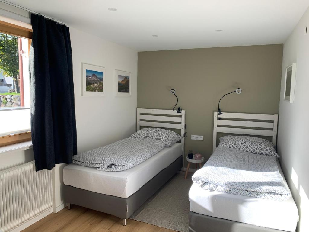 Postel nebo postele na pokoji v ubytování Alba Apartments