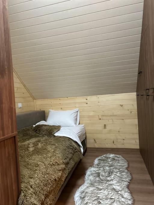 Postel nebo postele na pokoji v ubytování Golden Eagle Jelovica