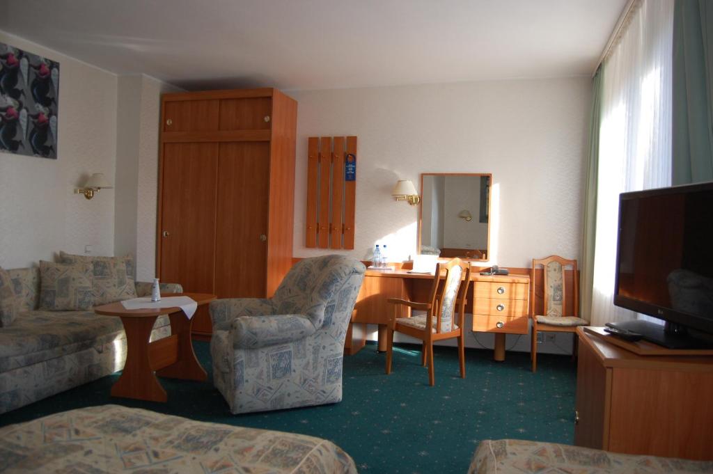 TV a/nebo společenská místnost v ubytování Hotel Wodnik
