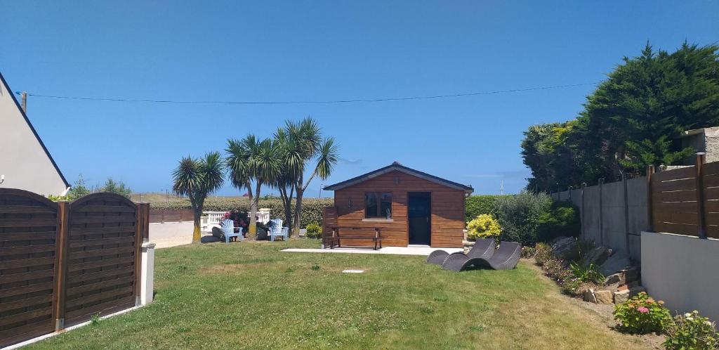 Ogród w obiekcie Le Sentier Des Dunes "LE GARAGE"
