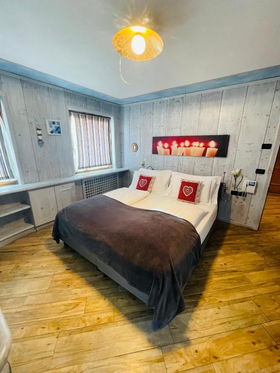 Posteľ alebo postele v izbe v ubytovaní Hotel Piccolo Tibet