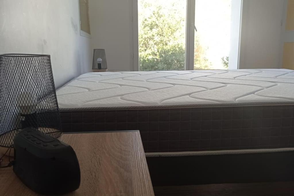Postel nebo postele na pokoji v ubytování 400m de la plage Maison 3 chambres avec jardin