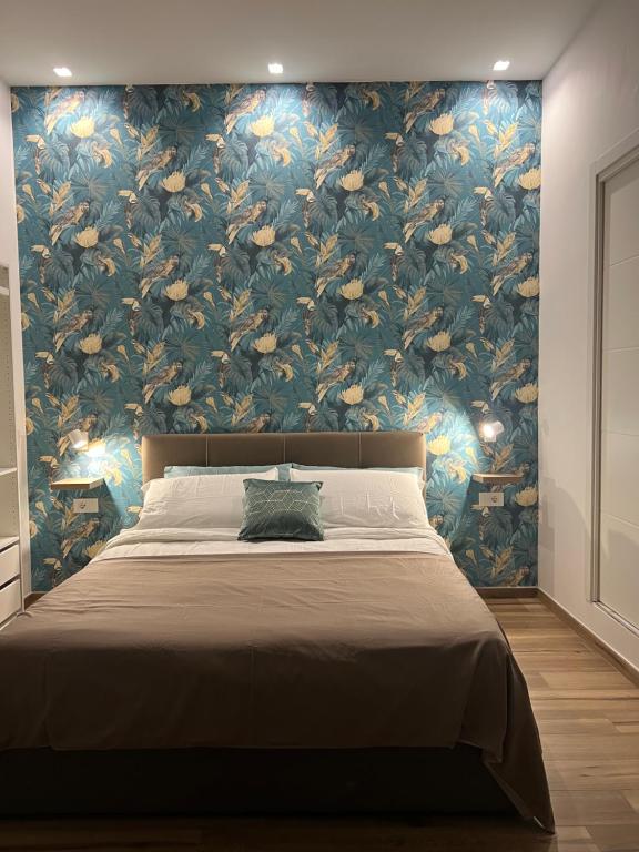 Postel nebo postele na pokoji v ubytování guest house Napul'è