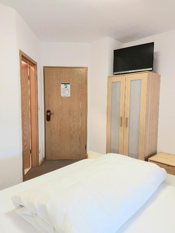 Postel nebo postele na pokoji v ubytování Gästehaus Langhammer