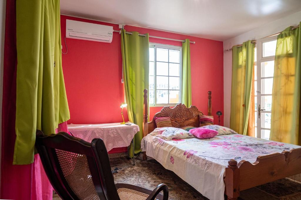 Postel nebo postele na pokoji v ubytování Domaine Lyscelle