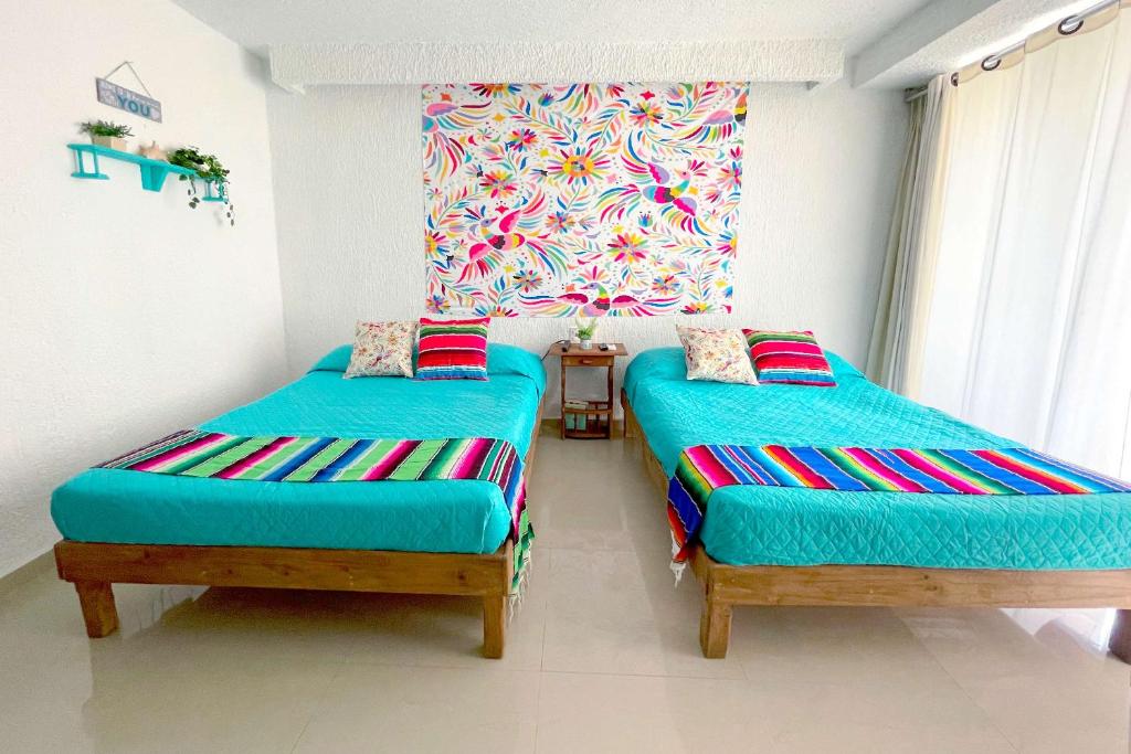 Postel nebo postele na pokoji v ubytování Renovated Studio in Cancun Beach at the Hotel Zone