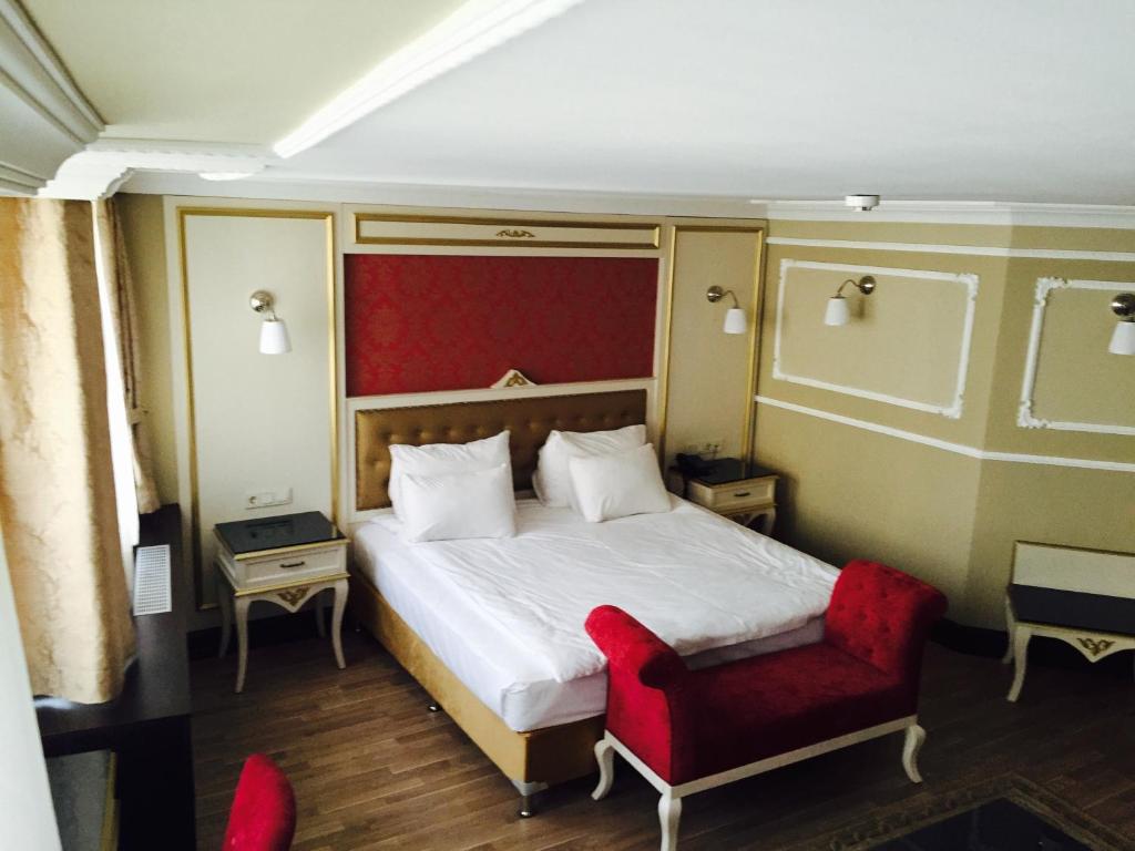 Postel nebo postele na pokoji v ubytování Kadikoy Park Suites
