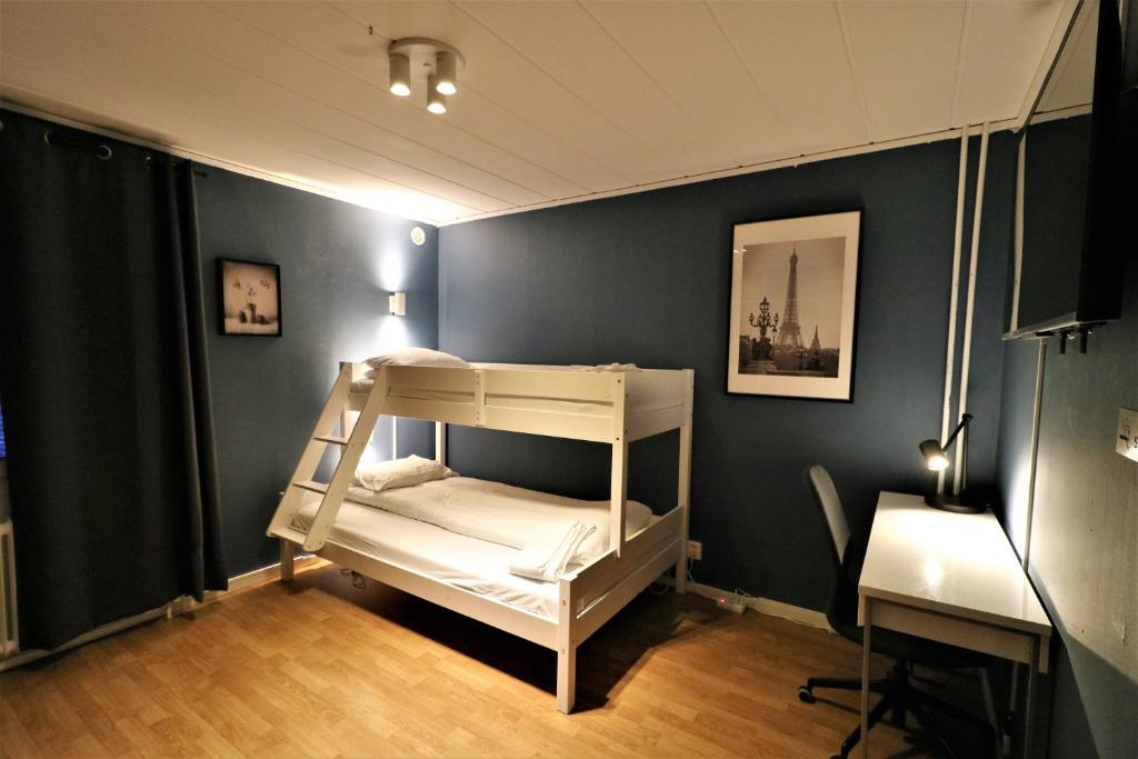 Postel nebo postele na pokoji v ubytování RIBO Apartment Arctic