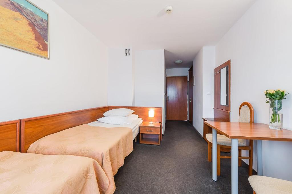 Postel nebo postele na pokoji v ubytování Wołosań B&B