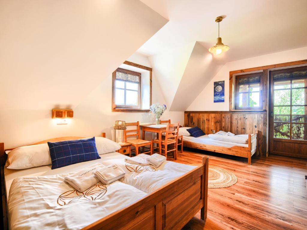 Postel nebo postele na pokoji v ubytování Gościniec Rabe - Agro&SPA