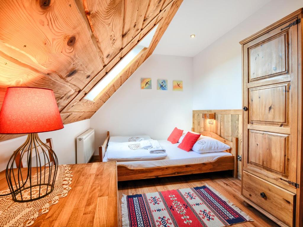 Postel nebo postele na pokoji v ubytování Gościniec Rabe - Agro&SPA