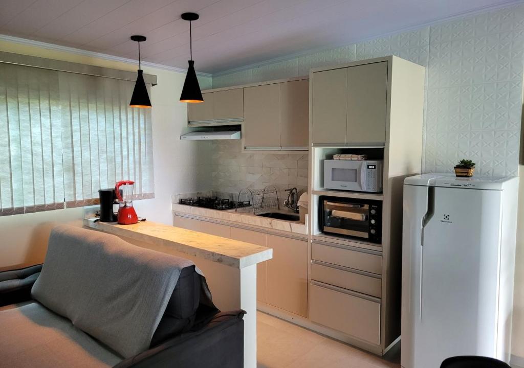 Kuchyň nebo kuchyňský kout v ubytování Flat Dona Branca