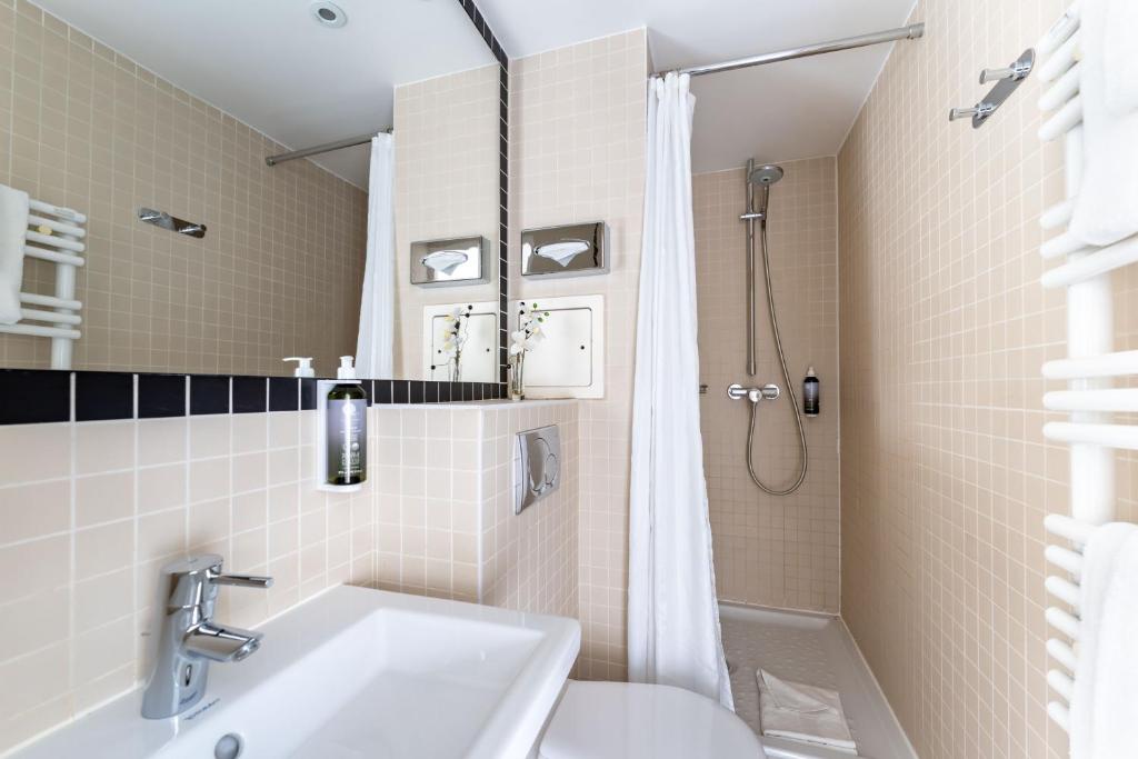 Ванна кімната в Hotel Palm - Astotel