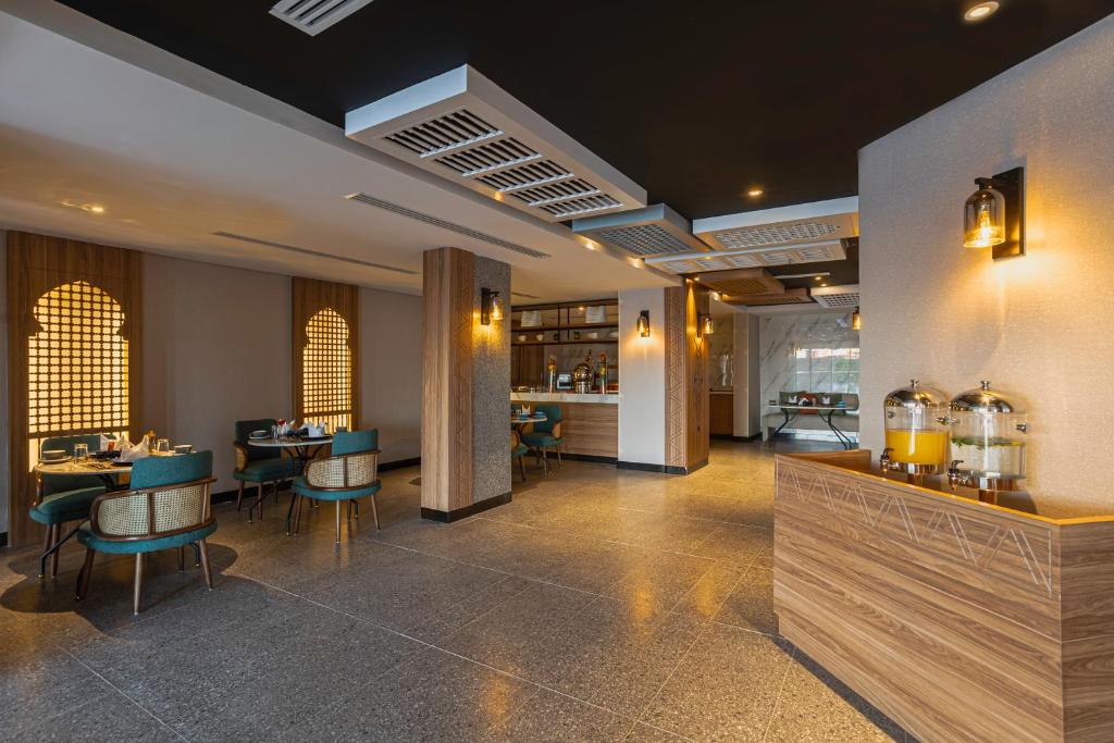 Restaurace v ubytování Ewaa Express Hotel - Al Shati