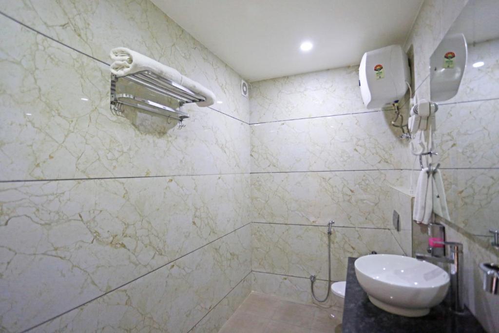 Koupelna v ubytování Hotel Decent Suites - Delhi Airport