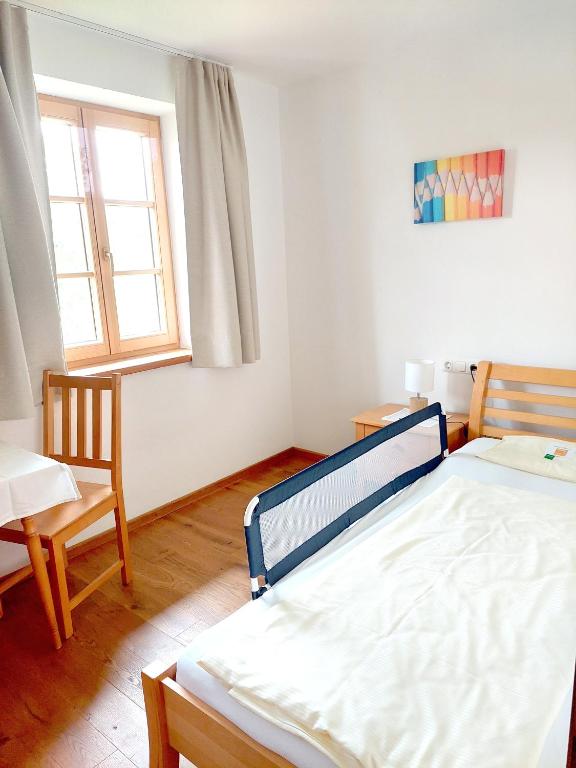 Postel nebo postele na pokoji v ubytování Weslhof