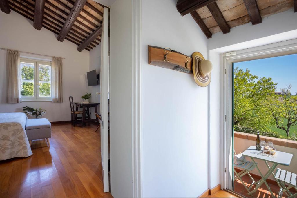 Posteľ alebo postele v izbe v ubytovaní Villa LeMarche b&b