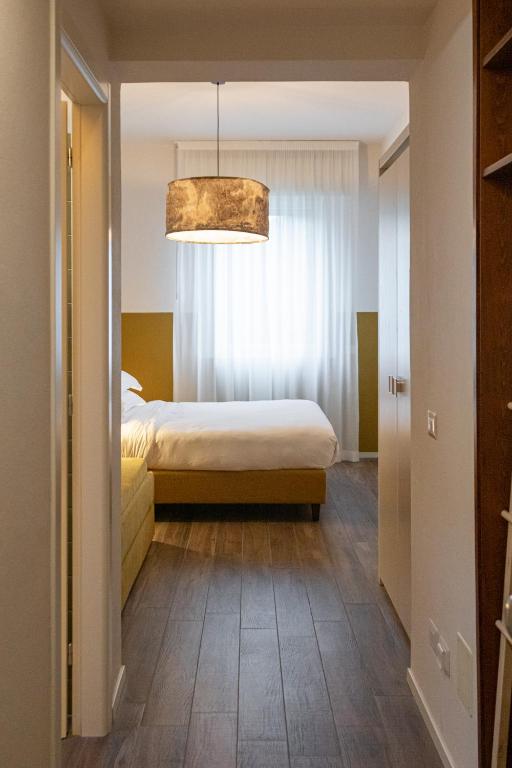 Postel nebo postele na pokoji v ubytování Lu. b&b