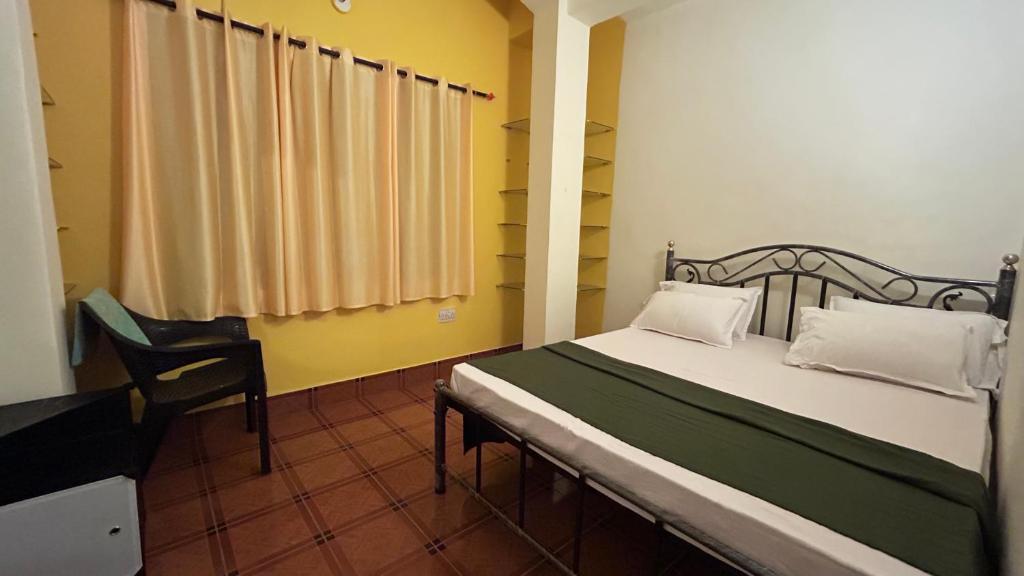 Postel nebo postele na pokoji v ubytování Muffys Guest House