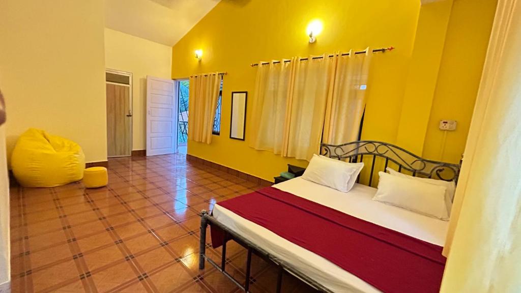 Postel nebo postele na pokoji v ubytování Muffys Guest House