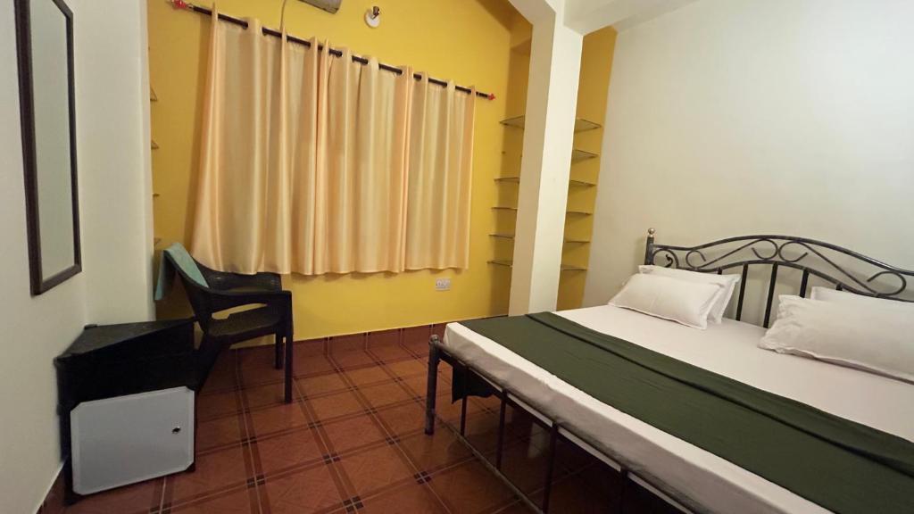 Postel nebo postele na pokoji v ubytování Muffys Guest House
