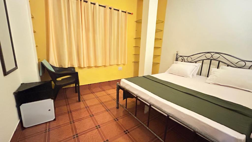 Postel nebo postele na pokoji v ubytování Muffys Guest House