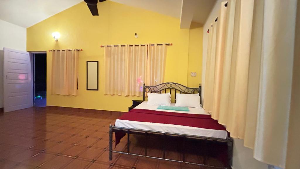 Postel nebo postele na pokoji v ubytování Muffys Guest House