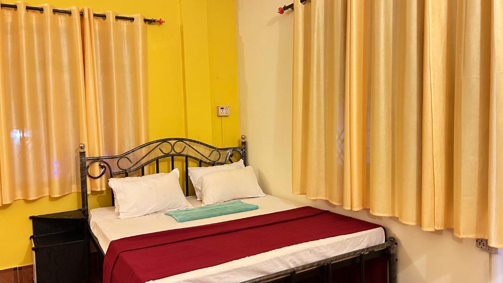 Postel nebo postele na pokoji v ubytování Muffys Guest House
