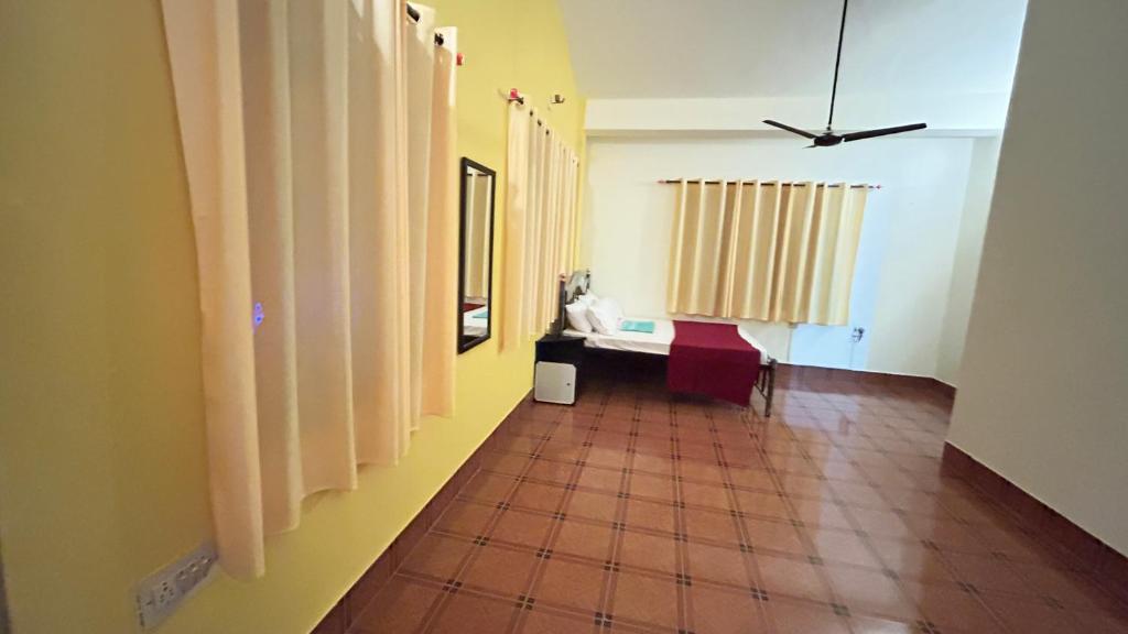 Postel nebo postele na pokoji v ubytování Muffys Guest House