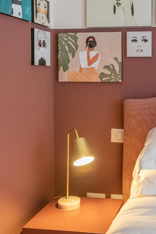 Postel nebo postele na pokoji v ubytování Lu. b&b