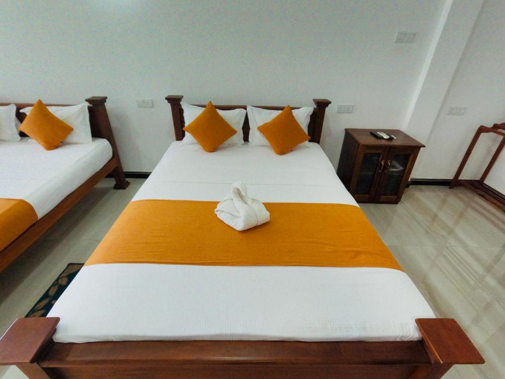 Postel nebo postele na pokoji v ubytování Ama Residence