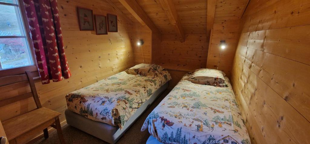 Postel nebo postele na pokoji v ubytování Chalet Casteol