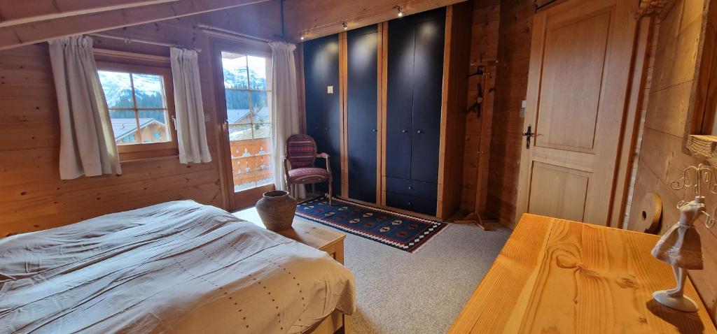 Postel nebo postele na pokoji v ubytování Chalet Casteol