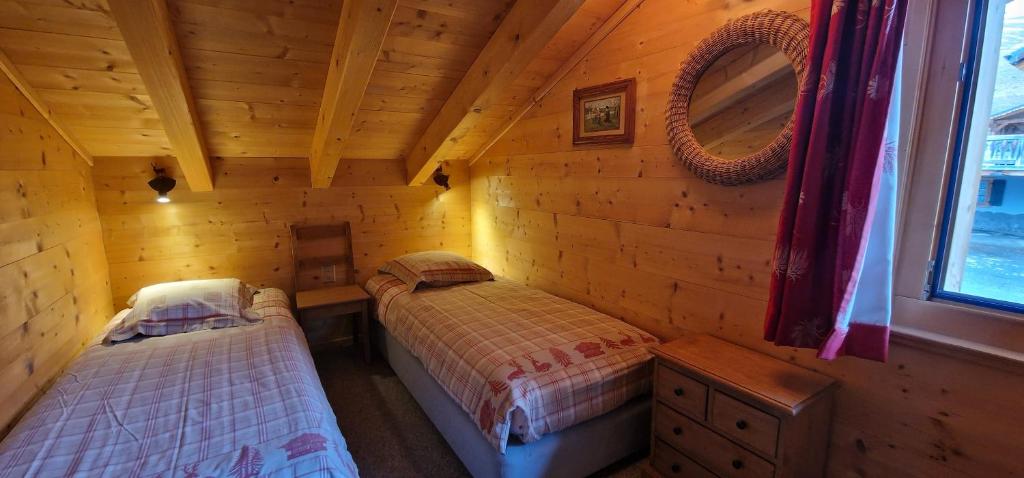 Postel nebo postele na pokoji v ubytování Chalet Casteol