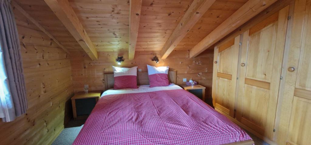 Postel nebo postele na pokoji v ubytování Chalet Casteol