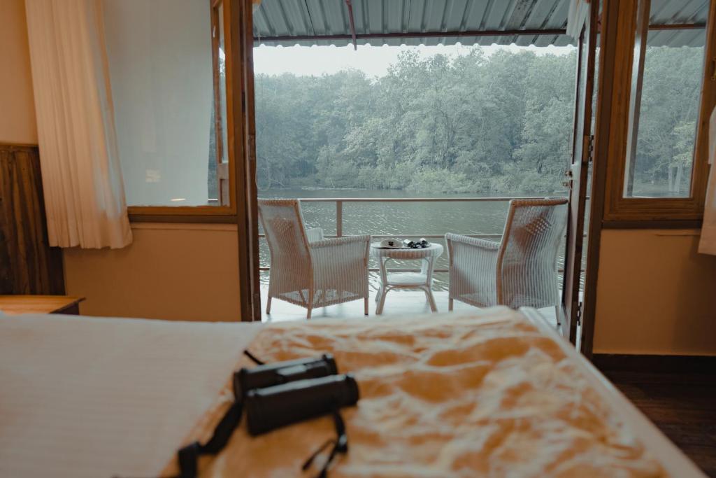 Postel nebo postele na pokoji v ubytování Rukhad Jungle Camp - Pench