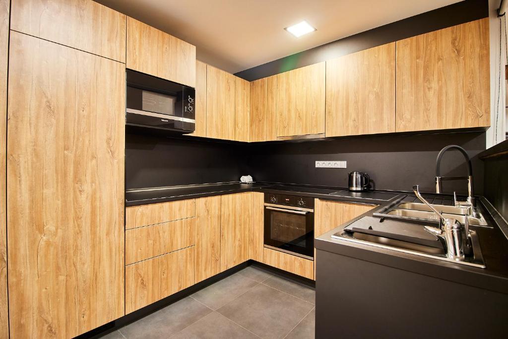 Kuchyň nebo kuchyňský kout v ubytování Apartmány Výsluní