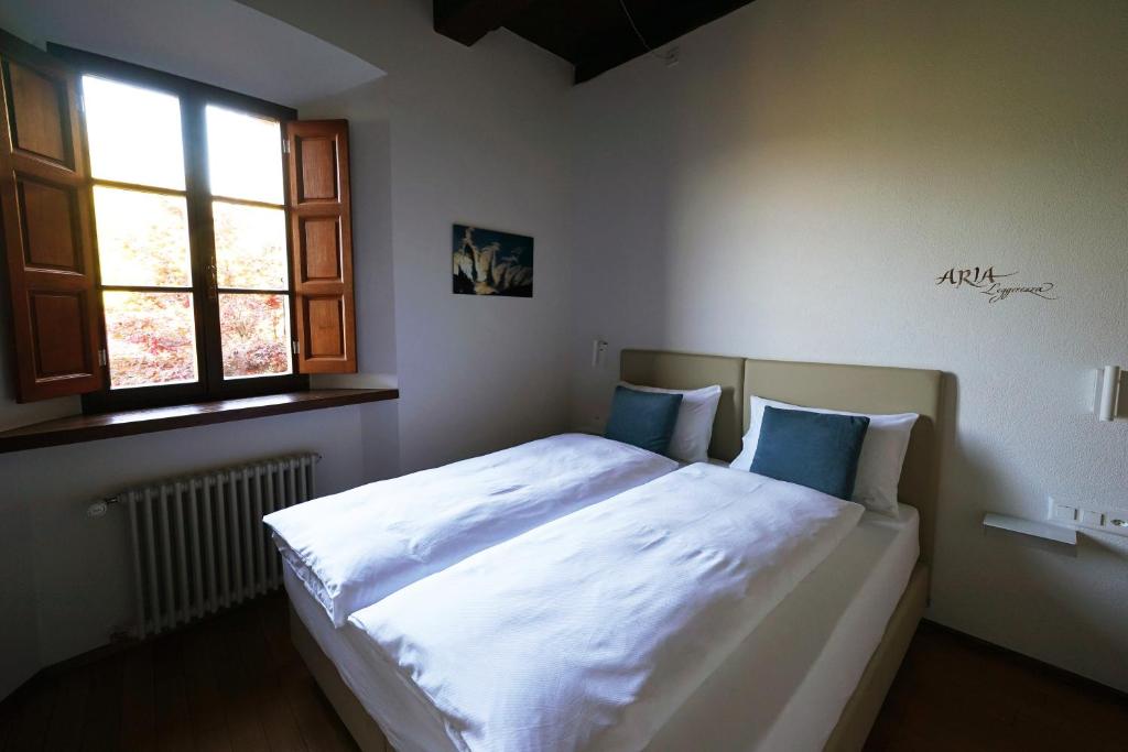 Postel nebo postele na pokoji v ubytování Ar Convént B&B
