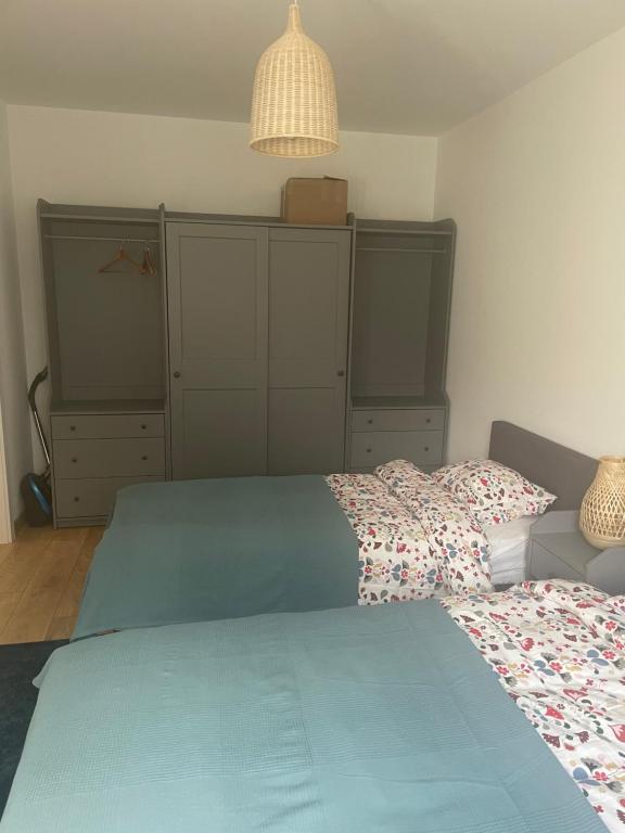 Posteľ alebo postele v izbe v ubytovaní Apartament Marta na Spokojnej