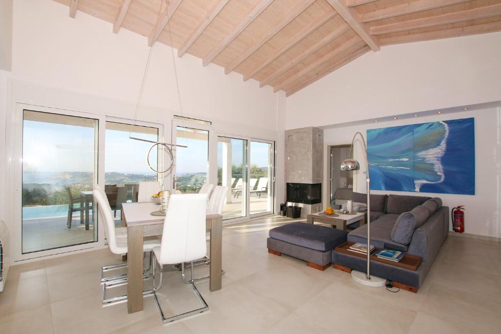 Posezení v ubytování Sunset Sea View Villa 10