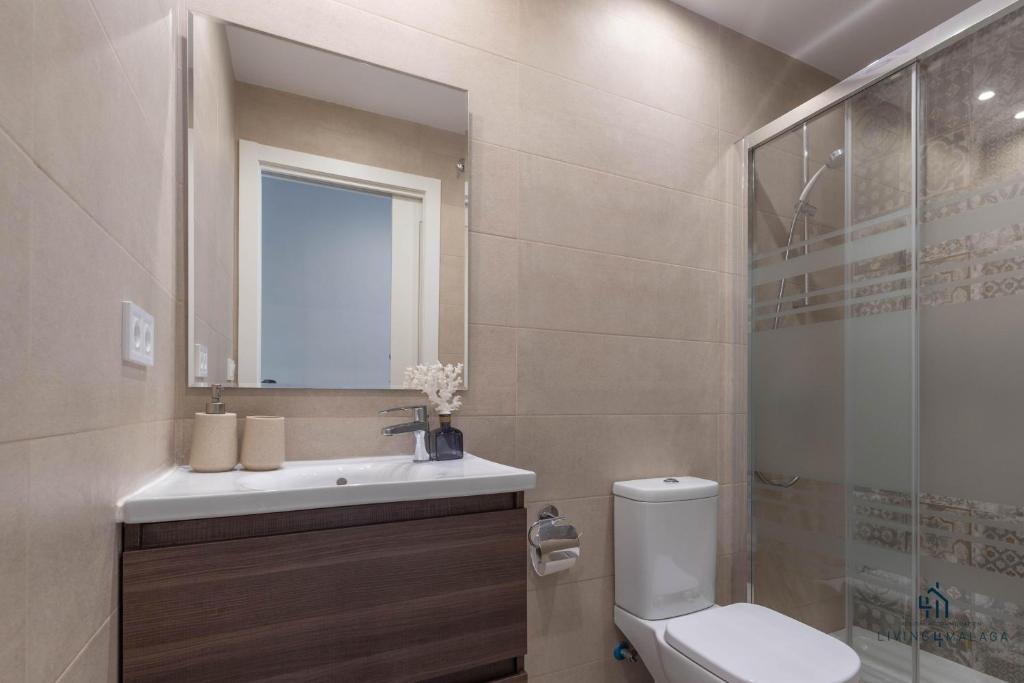 Kúpeľňa v ubytovaní Living4Malaga Picasso Deluxe Apartment