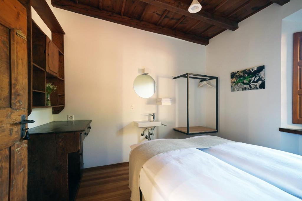 Postel nebo postele na pokoji v ubytování Ar Convént B&B