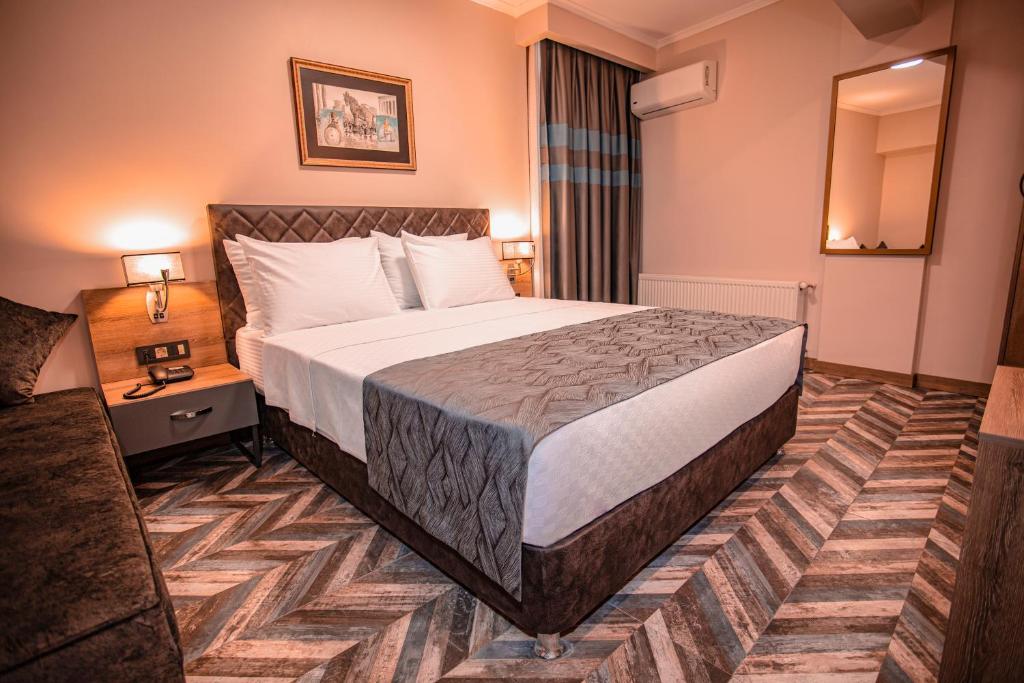 Postel nebo postele na pokoji v ubytování Hotel Kale 17