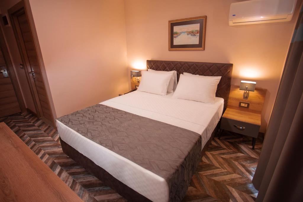 Postel nebo postele na pokoji v ubytování Hotel Kale 17