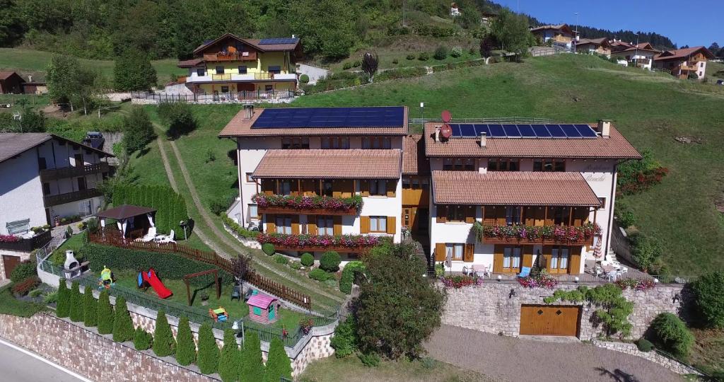 a model of a house with solar panels on it at Residence Ronchi in Molveno