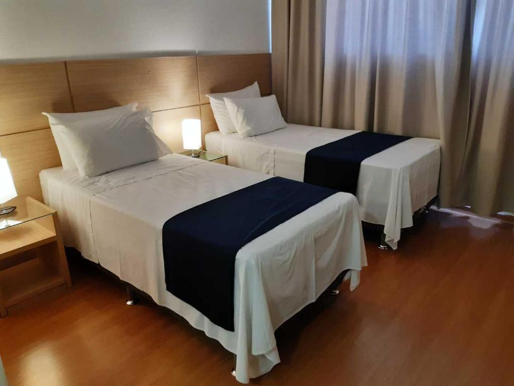 Postel nebo postele na pokoji v ubytování Hotel Franco