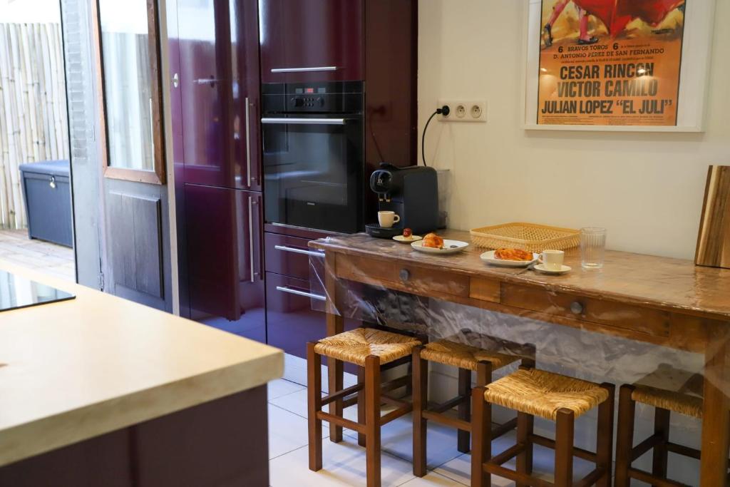 Kuchyňa alebo kuchynka v ubytovaní La Terrasse Vaugelas - 2 bedroom apartment with terrace