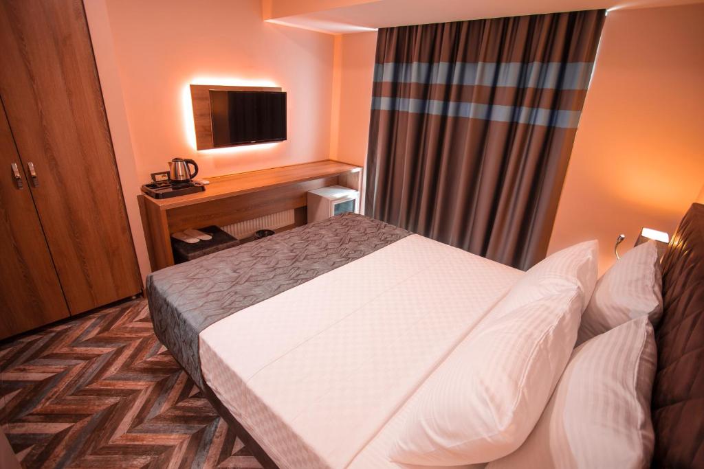 Postel nebo postele na pokoji v ubytování Hotel Kale 17