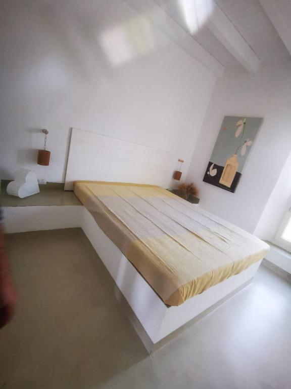 Postel nebo postele na pokoji v ubytování Masseria a libeccio